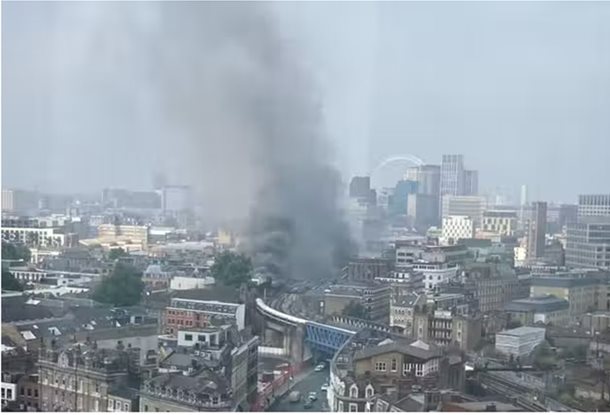 smoke over Southwark railway arches fire, London skyline